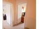 Hallway with doorways leading to the bedrooms at 4412 Sandner Dr # 4412, Sarasota, FL 34243