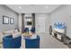 A stylish living room features modern decor, recessed lighting, and a sleek entertainment center at 4529 Crowell Ln, North Port, FL 34288