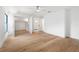 Spacious bedroom features wood floors, a ceiling fan, and a walk-in closet at 4620 Riverview Blvd, Bradenton, FL 34209