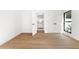 Bright bedroom boasts hardwood floors and an ensuite bathroom, perfect for relaxation at 4620 Riverview Blvd, Bradenton, FL 34209