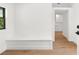 Bright hallway with window seat looks into the backyard at 4620 Riverview Blvd, Bradenton, FL 34209