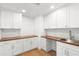 This functional laundry room offers ample storage, counter space, and modern design at 4620 Riverview Blvd, Bradenton, FL 34209