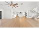 Spacious living area with kitchen and modern staircase at 4620 Riverview Blvd, Bradenton, FL 34209