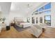 Serene main bedroom with large windows offering an abundance of natural light at 4620 Riverview Blvd, Bradenton, FL 34209