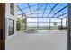 Screened-in pool and spa area offering beautiful waterfront view at 4620 Riverview Blvd, Bradenton, FL 34209