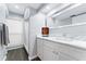 Modern bathroom features a marble vanity top, stylish cabinets, and a beautifully tiled walk-in shower at 5236 Siesta Cove Dr, Sarasota, FL 34242