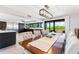 Dining area with stylish table, seating, and natural light at 5236 Siesta Cove Dr, Sarasota, FL 34242