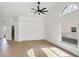 Spacious main bedroom with vaulted ceilings, large windows, and an en-suite bathroom at 6409 Stone River Rd, Bradenton, FL 34203