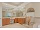 Bright bathroom featuring double sinks, a makeup vanity, and a large mirror at 6922 Stanhope Pl, University Park, FL 34201