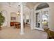 Bright and airy dining room with coffered ceiling, tile flooring, and large windows at 6922 Stanhope Pl, University Park, FL 34201