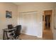 Office featuring a work desk, office chair, and closet for storage at 7113 52Nd E Dr, Bradenton, FL 34203