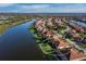 Discover the allure of this lakeside property with a manicured lawn and serene water views at 8284 Barton Farms Blvd, Sarasota, FL 34240