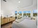 Bright, spacious bedroom with wood floors and lake views at 8284 Barton Farms Blvd, Sarasota, FL 34240