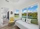 Bedroom offers lake view and a daybed at 8284 Barton Farms Blvd, Sarasota, FL 34240