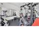 Well-equipped fitness center with modern exercise machines and mirrored walls for workouts at 8284 Barton Farms Blvd, Sarasota, FL 34240