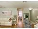 Inviting living space with open view to the bedroom and modern decor at 1129 Montrose Pl, Dunedin, FL 34698
