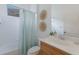 Cozy bathroom featuring a vanity, toilet, and shower with a blue shower curtain at 11728 Strandhill Ct, Lakewood Ranch, FL 34202