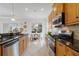 Well-lit kitchen featuring stainless steel appliances and a breakfast nook at 11728 Strandhill Ct, Lakewood Ranch, FL 34202
