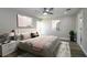 Comfortable bedroom with soft lighting, stylish wall art, and a plush bed for a relaxing retreat at 1471 Palmwood Dr, Sarasota, FL 34232