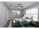 Inviting bedroom with natural light, ample closet space, and contemporary furnishings for a peaceful atmosphere at 1471 Palmwood Dr, Sarasota, FL 34232