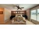 Comfortable main bedroom with neutral tones and a ceiling fan for added comfort at 1521 67Th Street E Ct, Bradenton, FL 34208