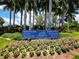 Community signage for The Resort at Longboat Key Club with meticulous landscaping and palm trees at 2065 Harbour Links Dr # 5, Longboat Key, FL 34228
