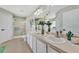 Bright bathroom features double sinks, a glass enclosed shower and a white vanity at 26052 Salonika Ln, Punta Gorda, FL 33983