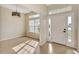 Foyer with a view to a living space with bright windows and natural light at 26052 Salonika Ln, Punta Gorda, FL 33983
