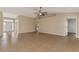Spacious living room boasts tile floors, high ceilings, and ample natural light at 26052 Salonika Ln, Punta Gorda, FL 33983