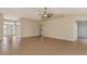 Spacious living room boasts tile floors, high ceilings, and ample natural light at 26052 Salonika Ln, Punta Gorda, FL 33983