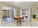 Cozy breakfast nook with patio access and a washer and dryer closet at 3522 57Th Avenue W Cir, Bradenton, FL 34210