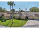 Charming villa with lush lawn and a tile roof, complemented by swaying palm trees on a sunny day at 3522 57Th Avenue W Cir, Bradenton, FL 34210