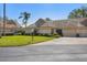 Inviting one-story home with well-kept lawn, tile roof, and a convenient attached garage at 3522 57Th Avenue W Cir, Bradenton, FL 34210