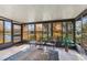Relaxing screened lanai featuring outdoor seating and peaceful views of the surrounding landscape at 3522 57Th Avenue W Cir, Bradenton, FL 34210