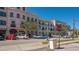 View of Howard Avenue intersection showing a street with colorful buildings and parked cars at 422 Burns Ct, Sarasota, FL 34236