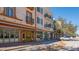 Charming street view showcasing storefronts with awnings and detailed architectural facades at 422 Burns Ct, Sarasota, FL 34236
