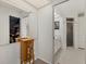 Hallway with bathroom, walk-in closet, and storage at 5008 30Th Street E Ct, Bradenton, FL 34203