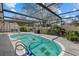 Private screened-in pool area, perfect for relaxing and entertaining, with a pristine backyard at 5008 30Th Street E Ct, Bradenton, FL 34203