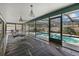 Screened-in lanai with covered dining area overlooking the refreshing pool at 5008 30Th Street E Ct, Bradenton, FL 34203