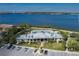 Aerial view of the clubhouse with a playground and waterfront views at 5040 Lake Overlook Ave, Bradenton, FL 34208
