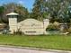 Elegant Tidewater Preserve community sign with lush landscaping and a serene water feature at 5040 Lake Overlook Ave, Bradenton, FL 34208