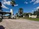 Tidewater Preserve entrance showcasing beautiful landscaping, water feature, and gatehouse at 5040 Lake Overlook Ave, Bradenton, FL 34208