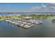 Aerial shot of a community marina featuring numerous boats and waterfront views at 5040 Lake Overlook Ave, Bradenton, FL 34208