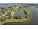 Aerial shot of well-maintained community tennis courts by the water at 5040 Lake Overlook Ave, Bradenton, FL 34208