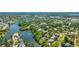 Aerial shot of a home on the water showing the neighborhood and waterways at 5135 Riverwood Ave, Sarasota, FL 34231