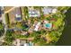 An aerial view of a single-Gathering residence, with a big yard and pool at 5135 Riverwood Ave, Sarasota, FL 34231
