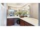 This bathroom includes dual sinks, and framed mirrors at 5135 Riverwood Ave, Sarasota, FL 34231