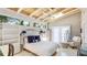 This bedroom features a wood plank ceiling, white tile floor, built-in shelving and recessed lighting at 5135 Riverwood Ave, Sarasota, FL 34231