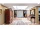 Grand entryway featuring decorative tile flooring, a skylight, and double doors at 5135 Riverwood Ave, Sarasota, FL 34231