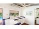 White cabinets, dark floors, and blue trim in this home's bright kitchen space at 5135 Riverwood Ave, Sarasota, FL 34231